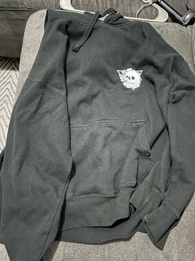 Black Hoodie with Small White Skull Graphic